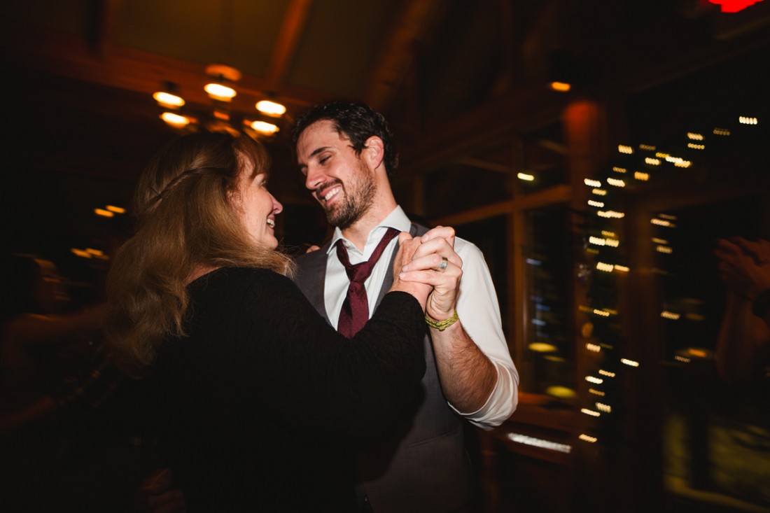 Groom dancing with his mom in the reception hall in edgewater lodge, Whistler