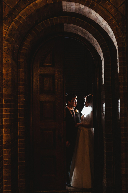 Couples behind the arc on the balcony of 2nd floor in Columbia University St Paul's Chapel
