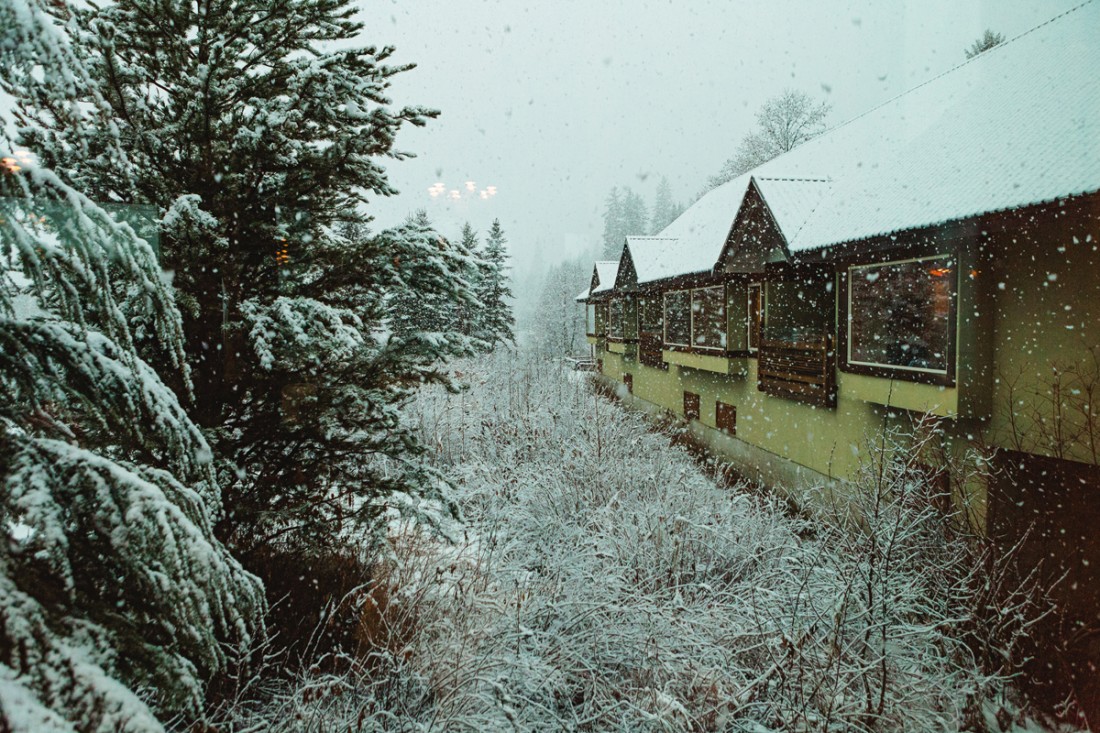 view of snow storm from edgewater lodge in whistler during vriginie and ty's wedding