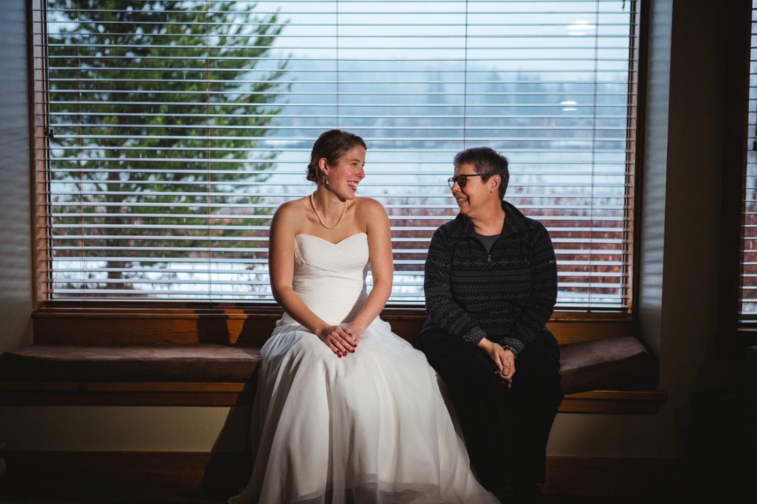 bride and her mother chatting before the ceremony starts